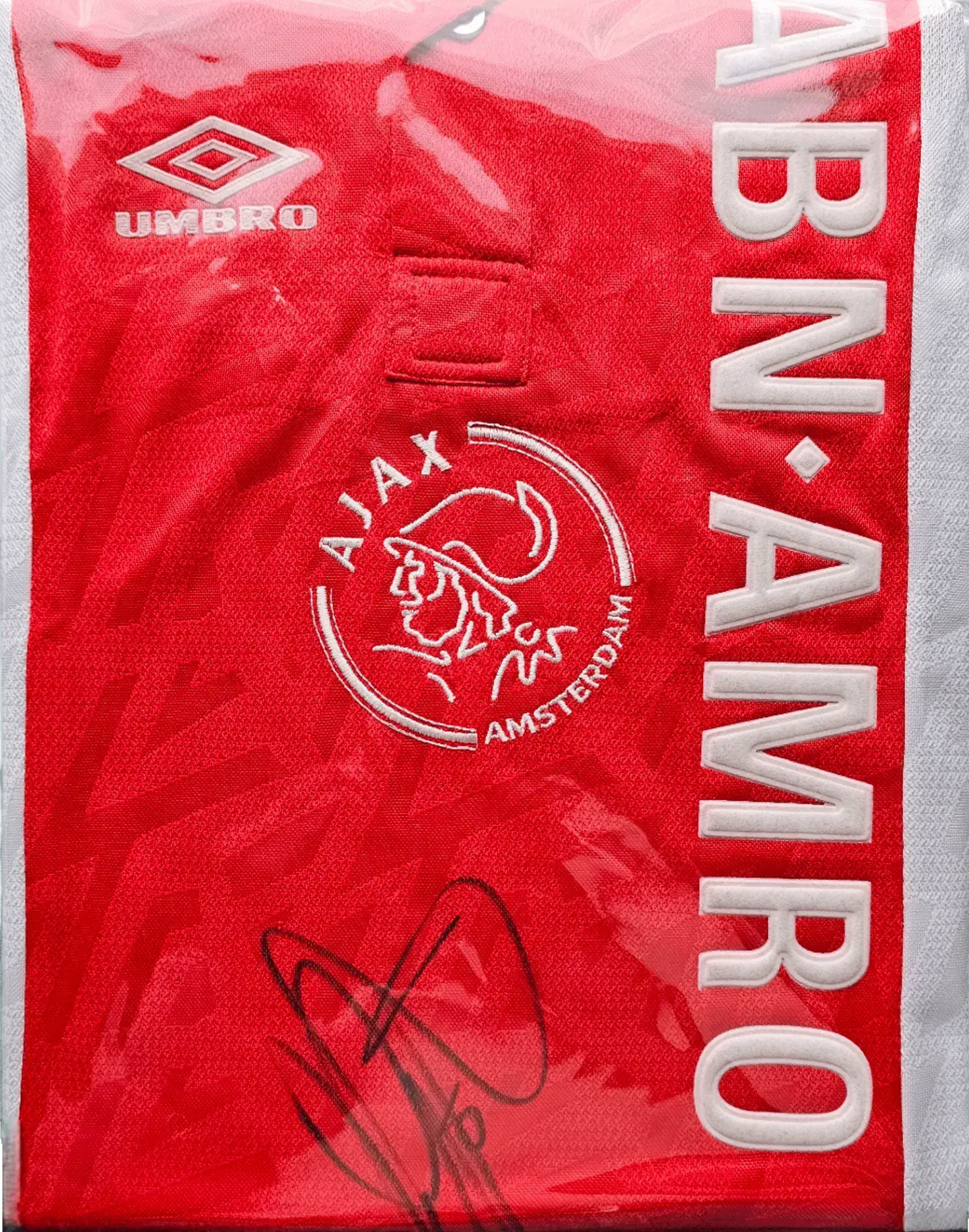 Crest featuring AJAX AMSTERDAM, Umbro logo, and Clarence Seedorf's signature on red shirt.