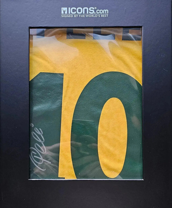 Front view of yellow football shirt featuring No. 10 and the signature of Pelé.