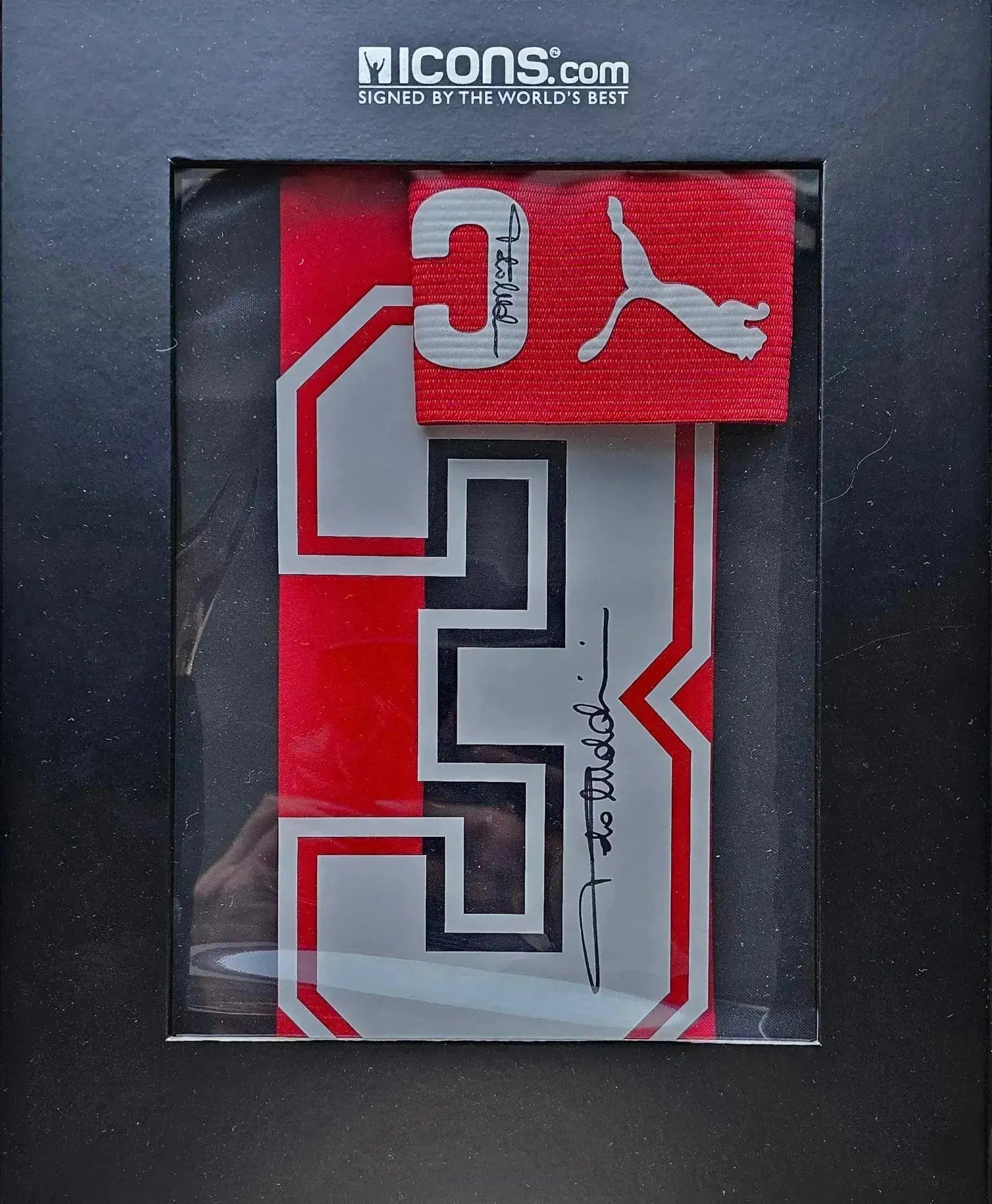 Front view of a signed AC Milan football shirt featuring No. 3 and visible signature.