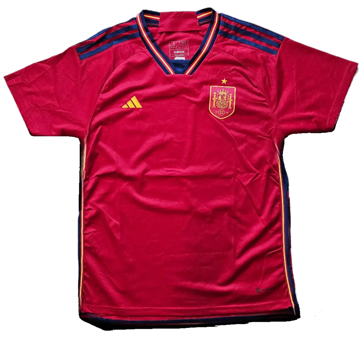 Front view of a red soccer jersey featuring the Spain crest, Adidas logo, and one star.