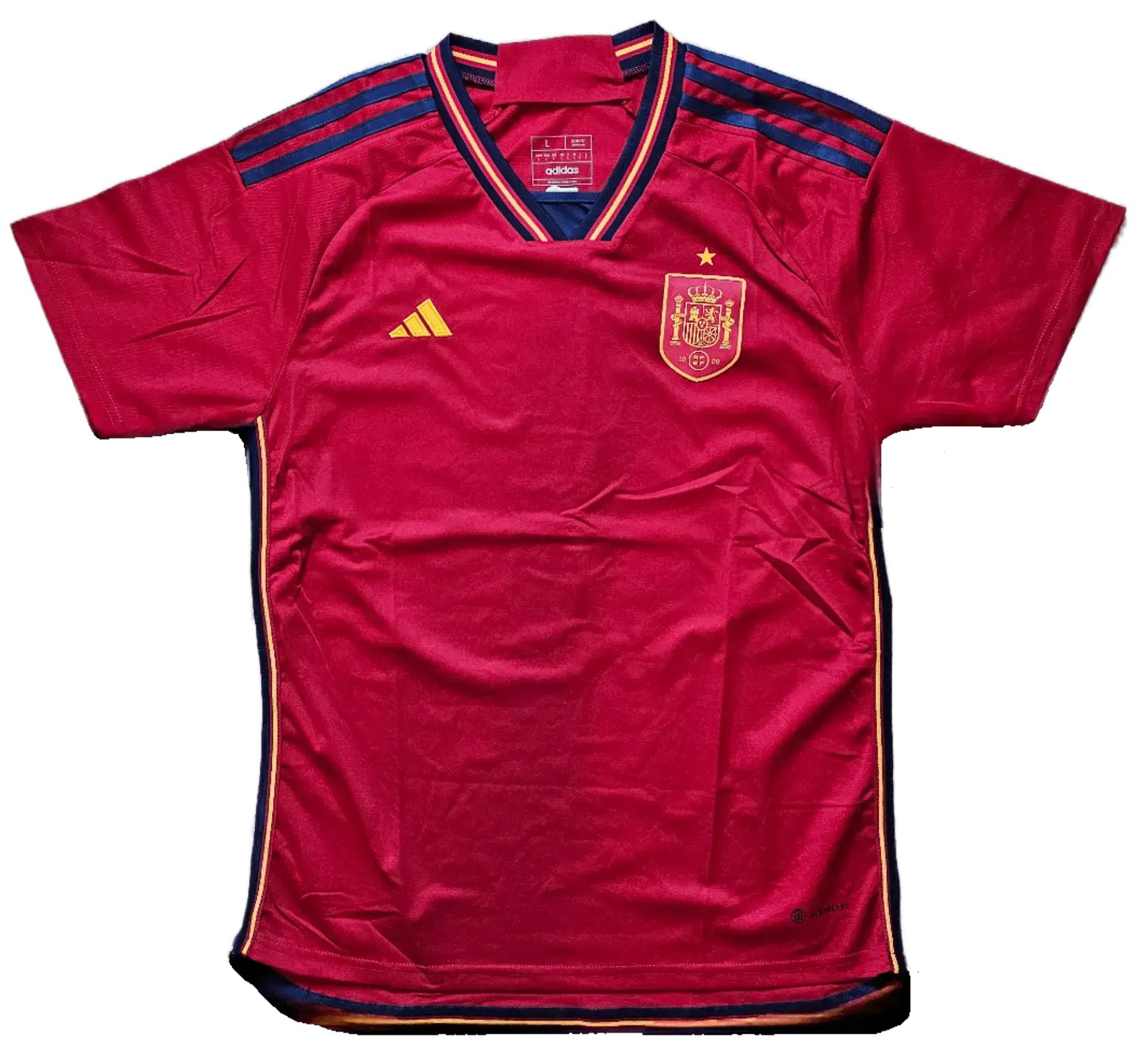 Front view of a red Spain soccer jersey featuring the crest and adidas logo, with one star.