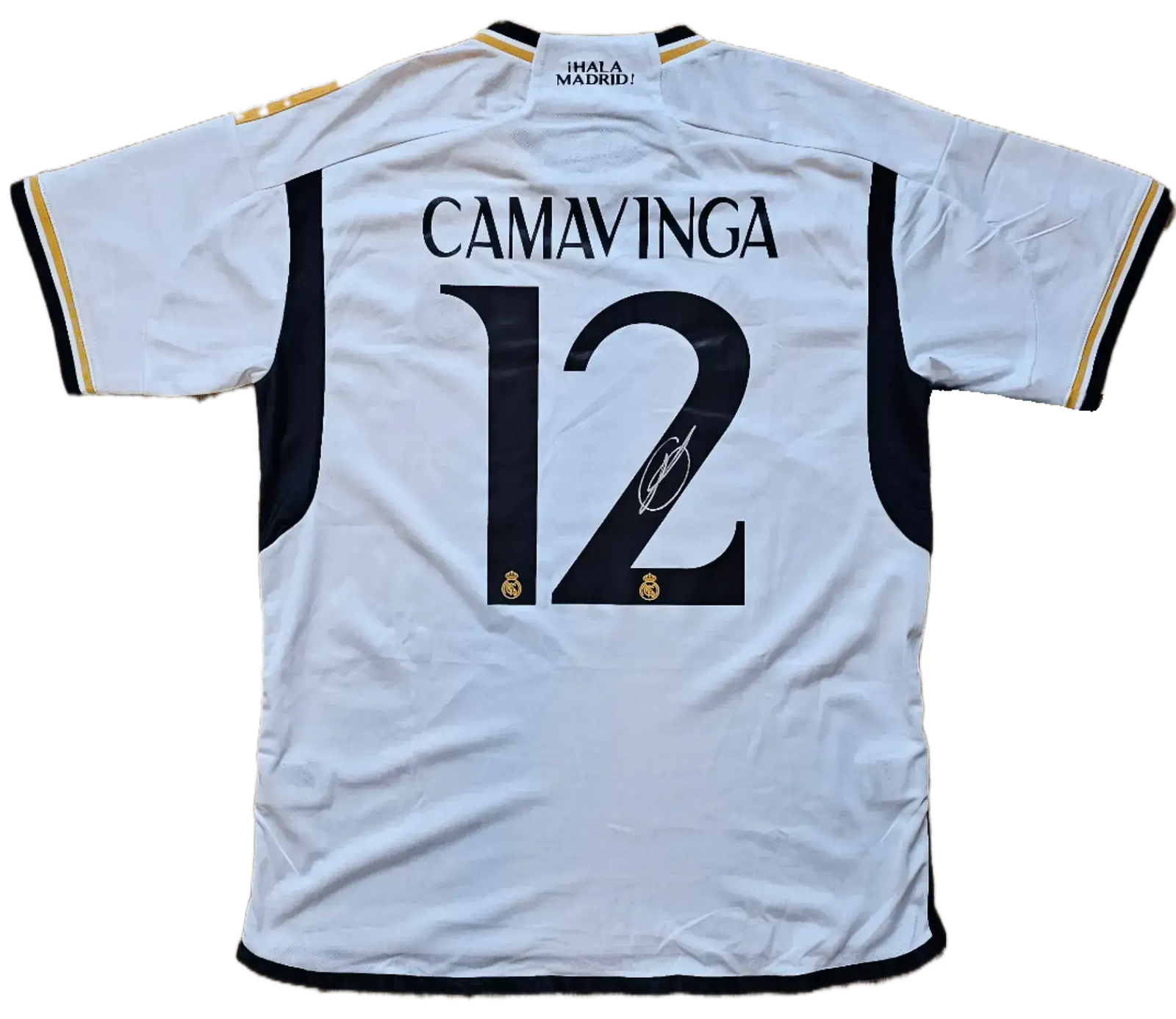 Back view featuring No. 12, Camavinga, and his signature on a white football shirt.