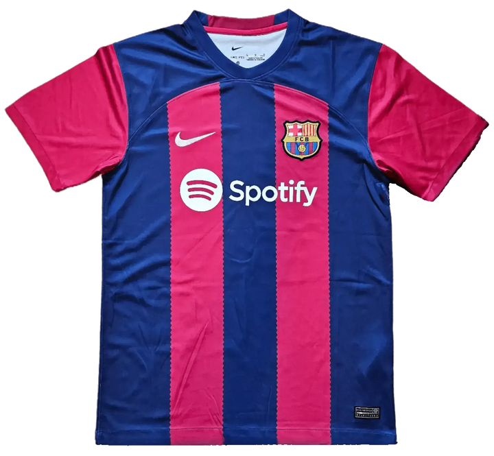 Front view of FC Barcelona football shirt in red and blue with Spotify logo and Nike swoosh.