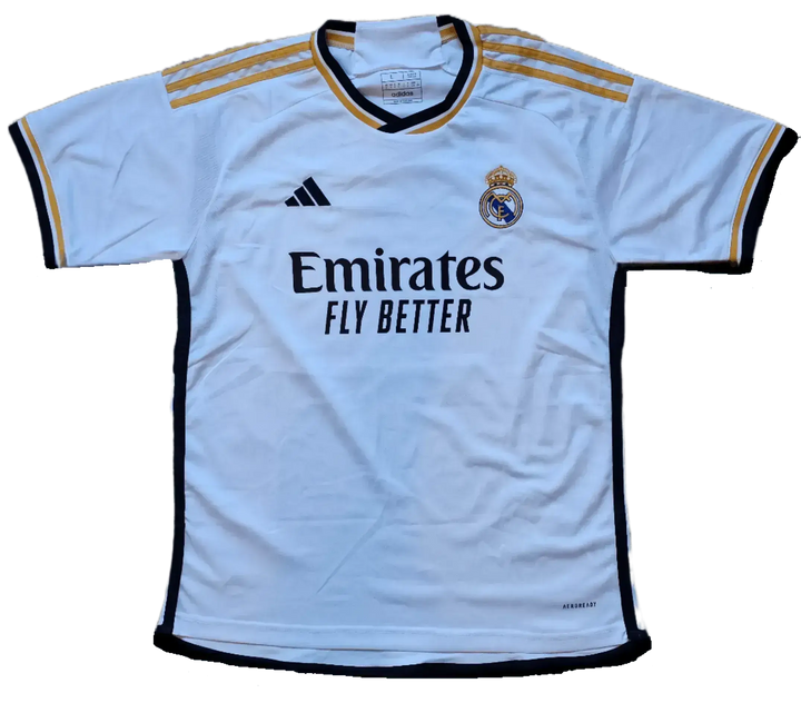 Front view of a Dani Carvajal signed Real Madrid football shirt featuring the Emirates sponsor logo.
