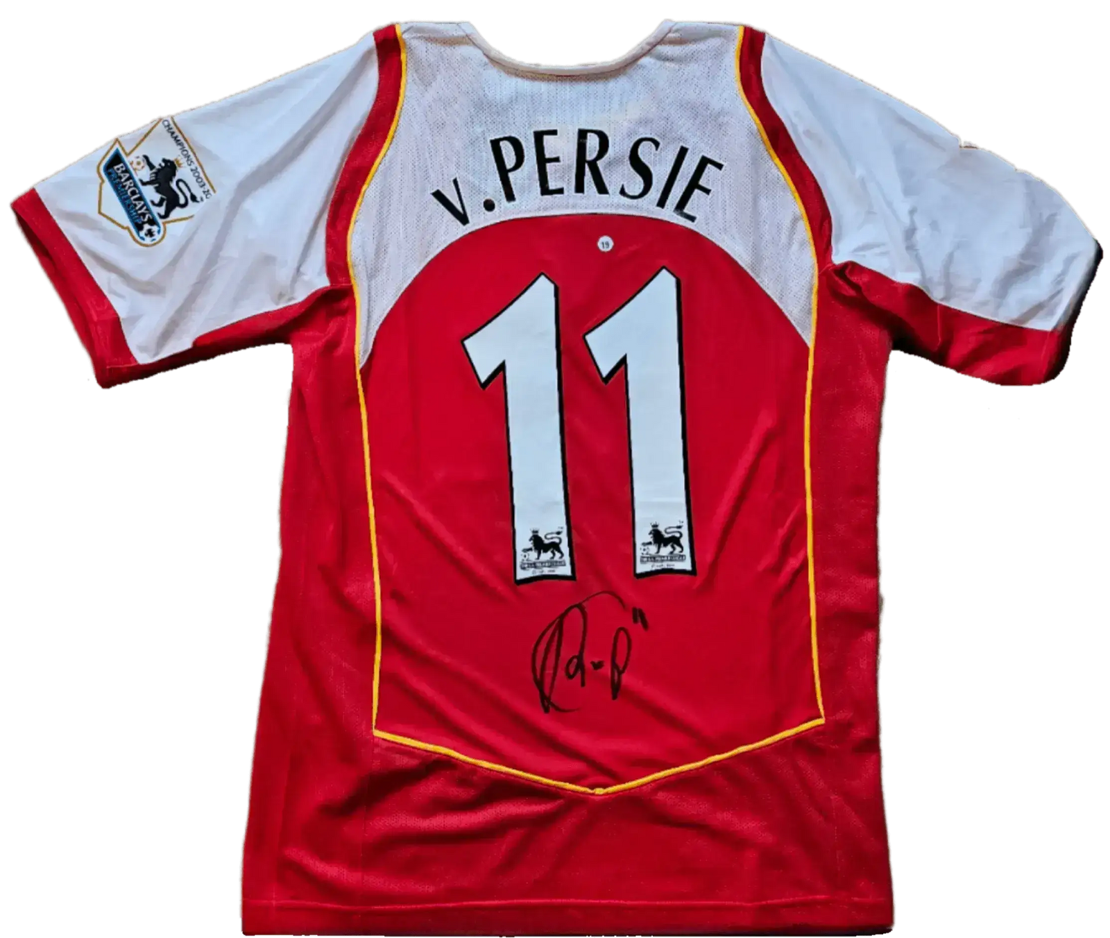 Back view showing No. 11, name 'V. Persie', and visible signature.