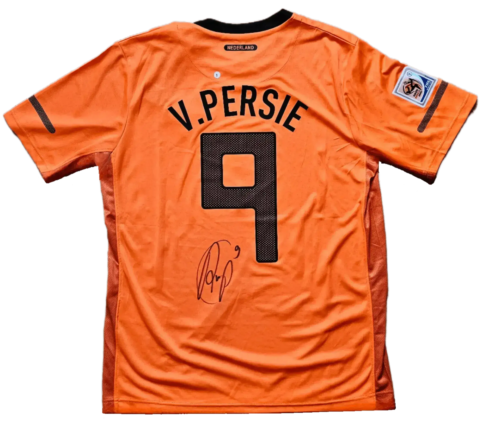 Back view of orange soccer jersey featuring V. Persie and No. 9 with a visible signature.