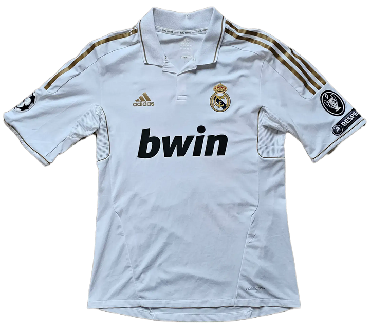 Front view of a white Real Madrid football shirt featuring bwin branding and Champions League patch.