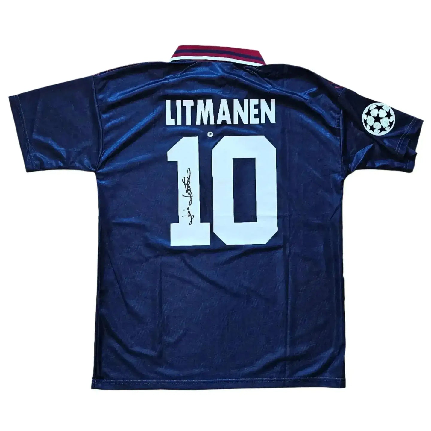 Back view showing Litmanen, No. 10, and a visible signature on a navy shirt.