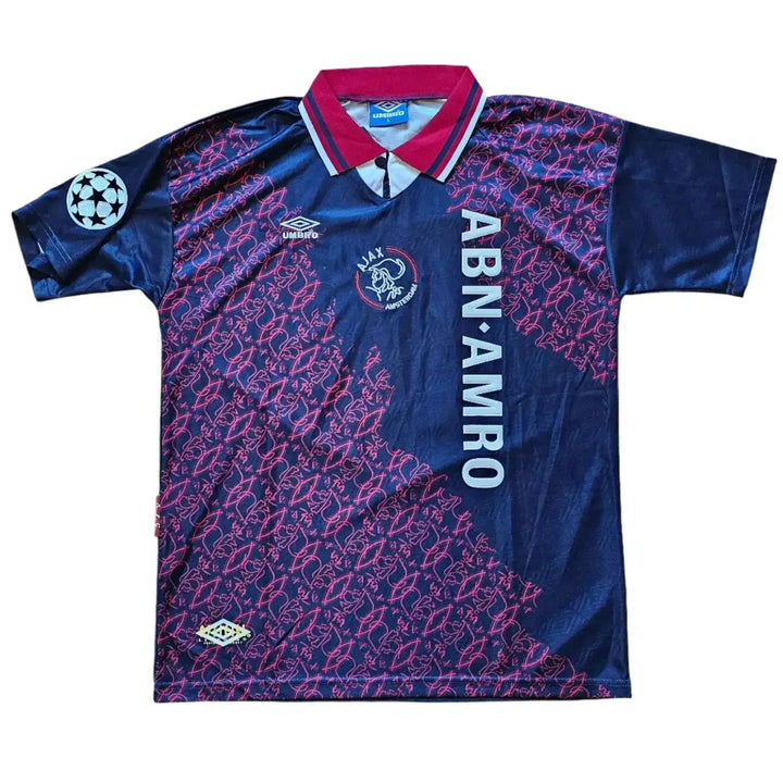 Front view of Jari Litmanen 10 football shirt with ABN AMRO sponsor and UEFA Champions League badge.