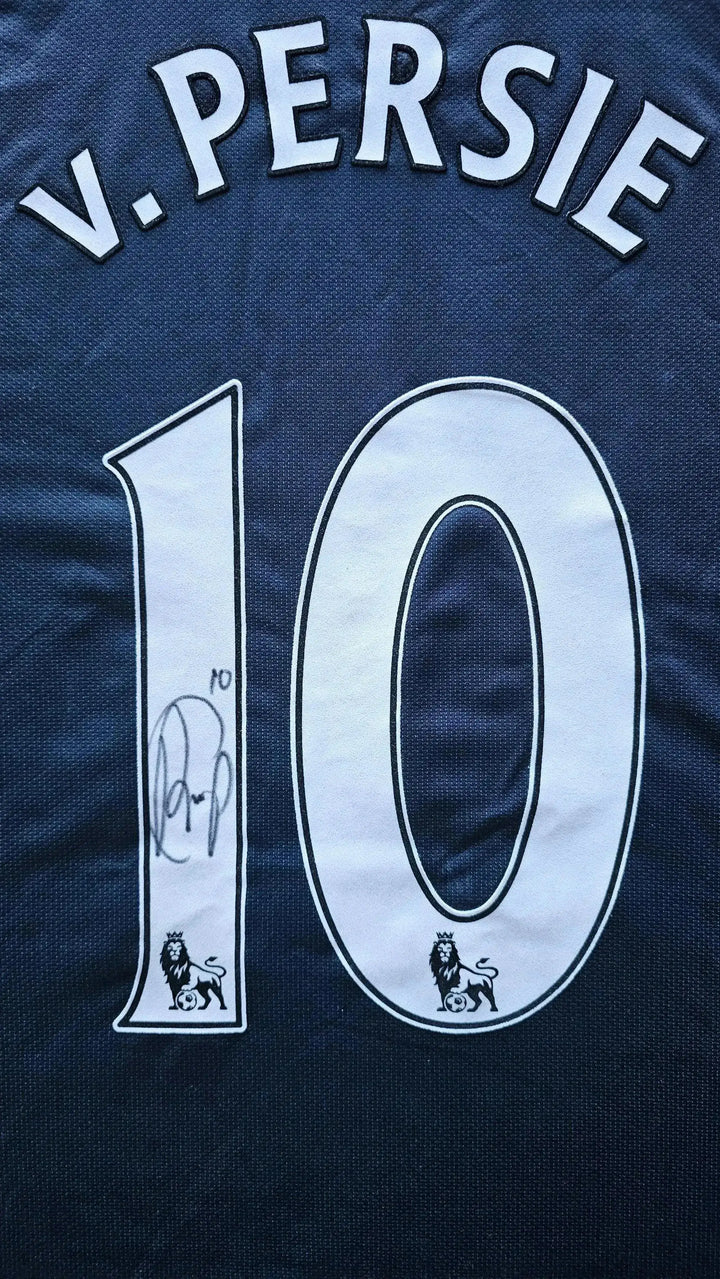 Back view featuring signature and No. 10 on navy soccer jersey with name &