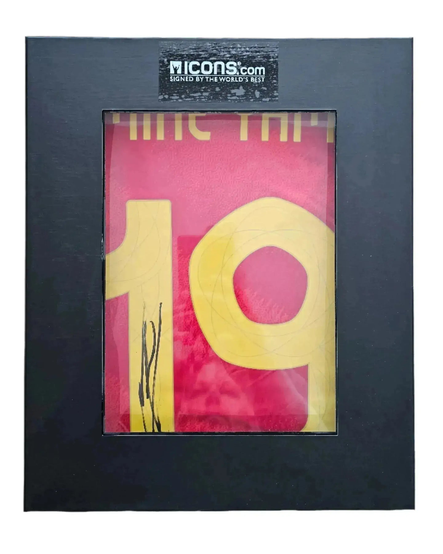 Back view showing No. 19 and signature on a red football shirt with yellow detailing.