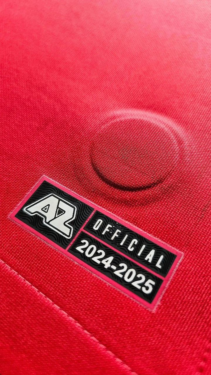 Detail view of the AZ Alkmaar logo and official label, featuring 2024-25.