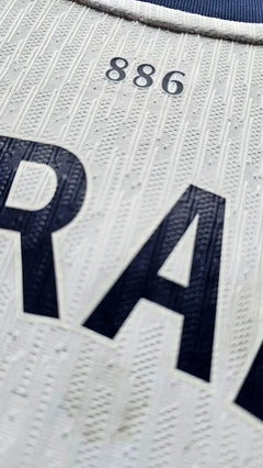 Close-up view of the No. 14 and name Gray on a Tottenham Hotspur football shirt.