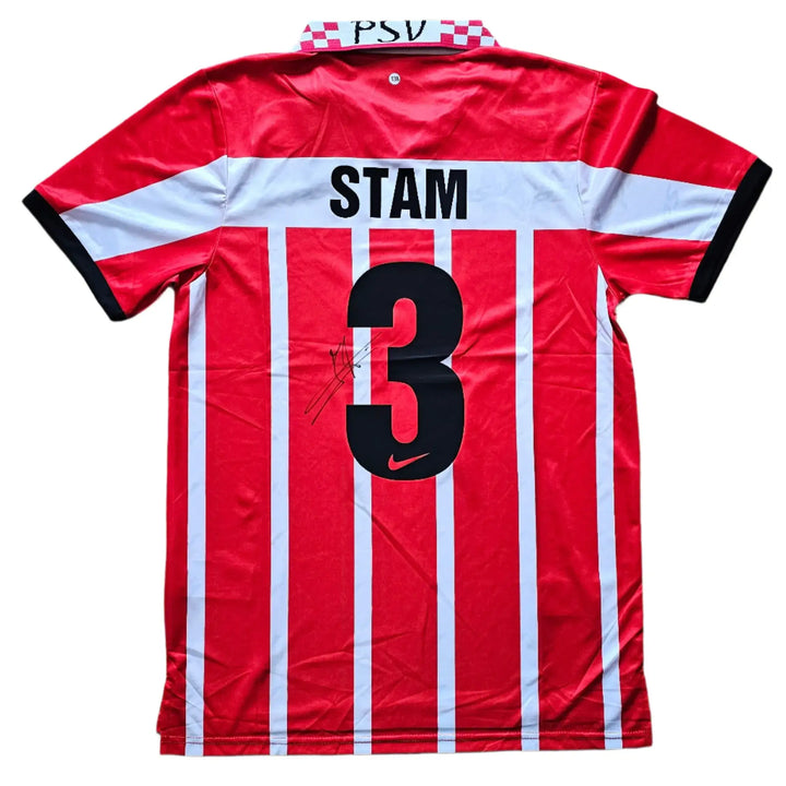 Back view showcasing No. 3, Stam, and visible signature details on a red and white striped football shirt.