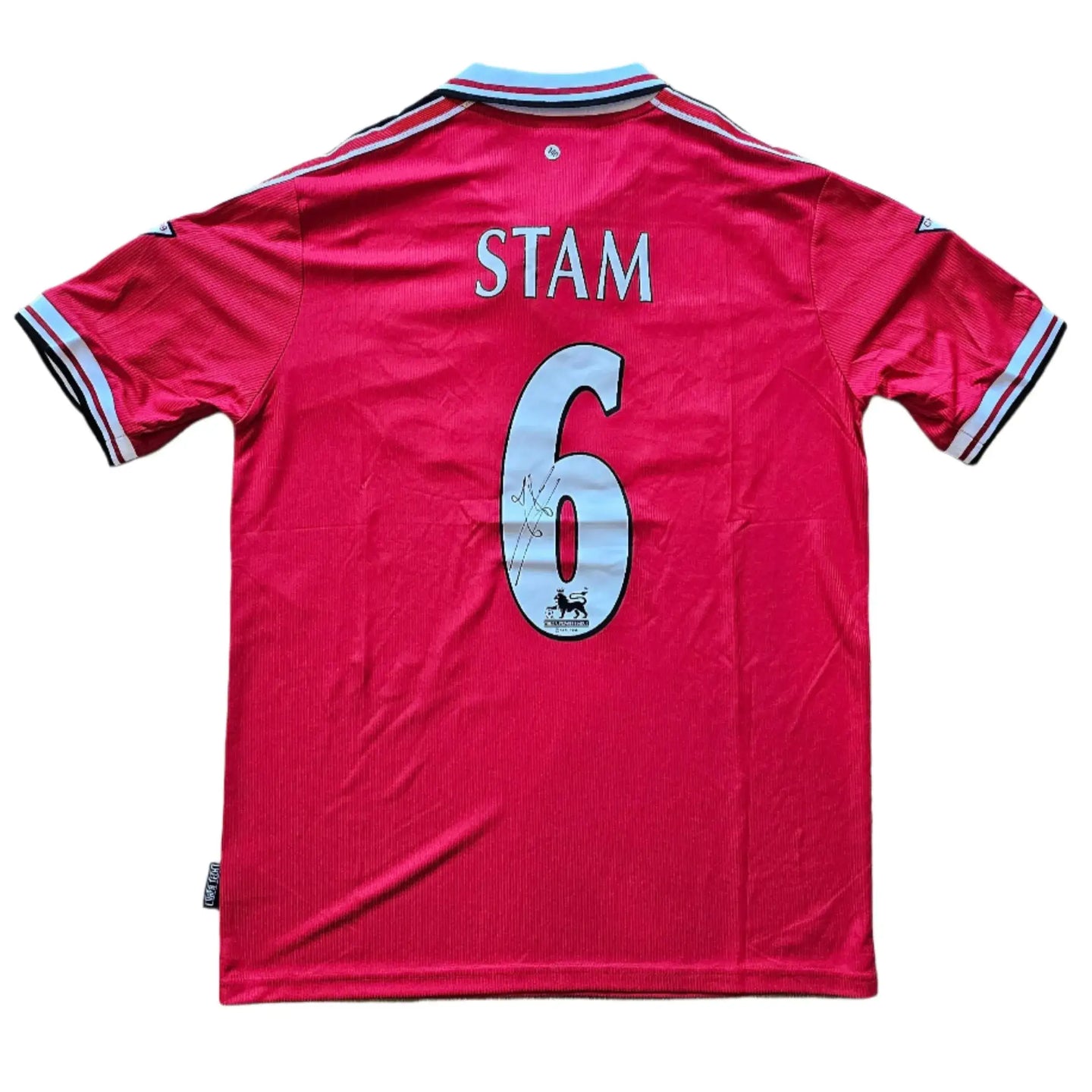 Back view featuring STAM and No. 6 with signature detail on Manchester United football shirt.