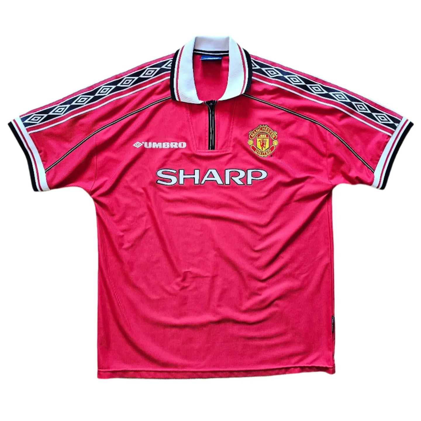 Front view of Jaap Stam 6 Manchester United signed football shirt featuring the Sharp sponsor and Umbro logo.