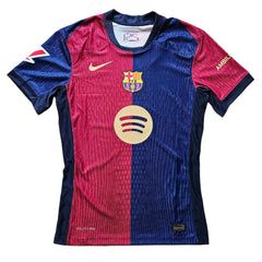 Front view of a signed Pau Cubarsi Barcelona football shirt featuring the crest and Spotify logo.