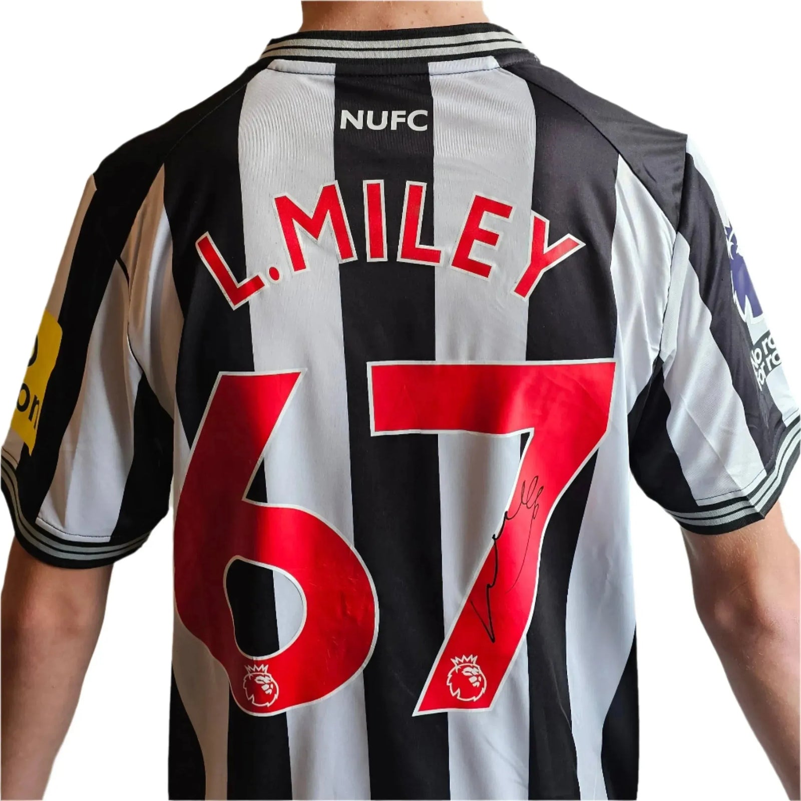 Back view featuring L. Miley, No. 67, and a visible signature on a Newcastle football shirt.