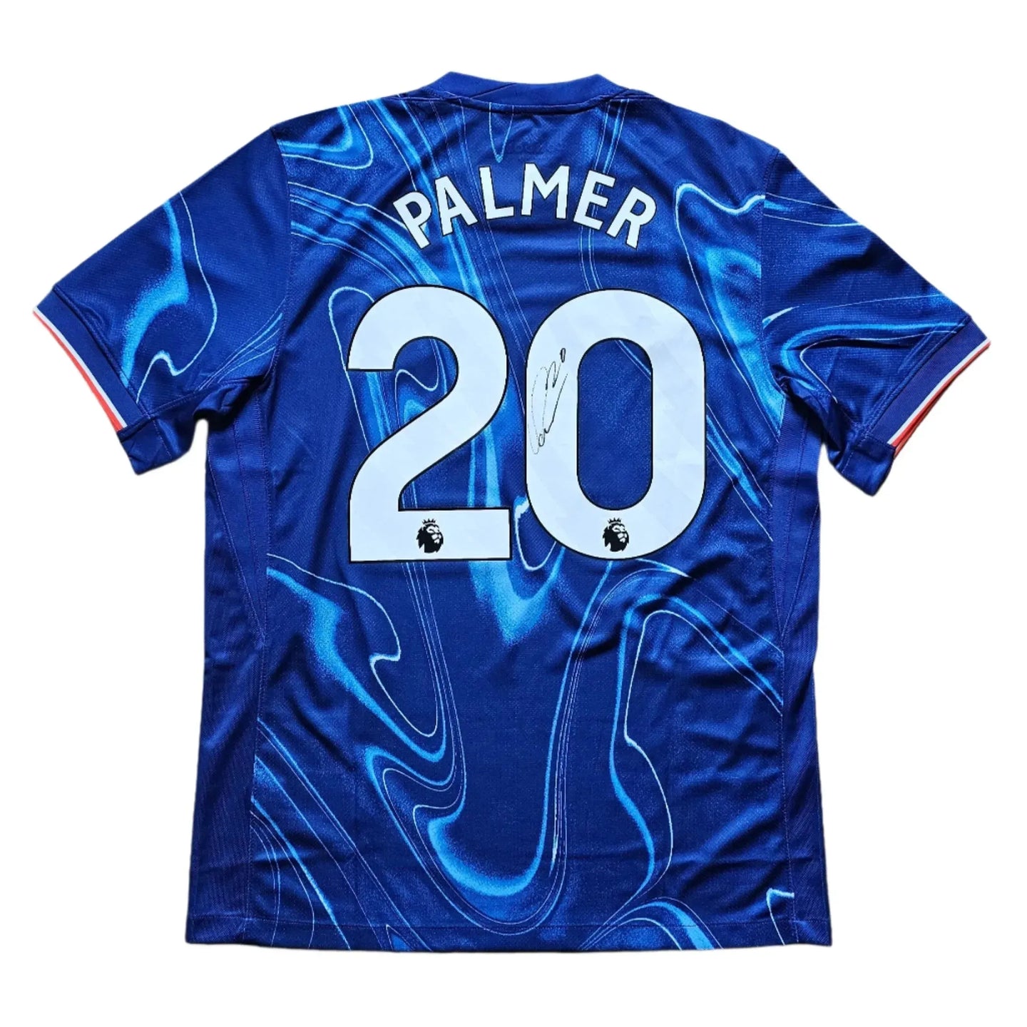 Back view featuring Palmer, No. 20, and a visible signature on a blue football shirt.