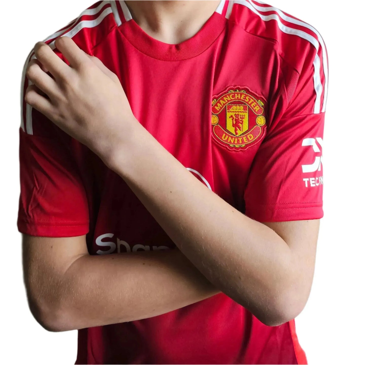 Front view featuring Manchester United crest on a red football shirt with white stripes.
