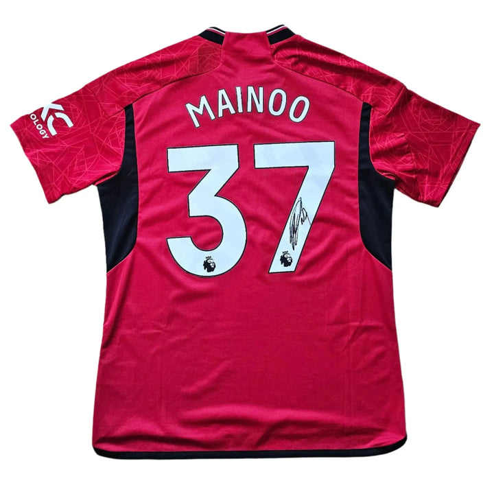 Back view showing No. 37 and the signature of Mainoo on a red football shirt.
