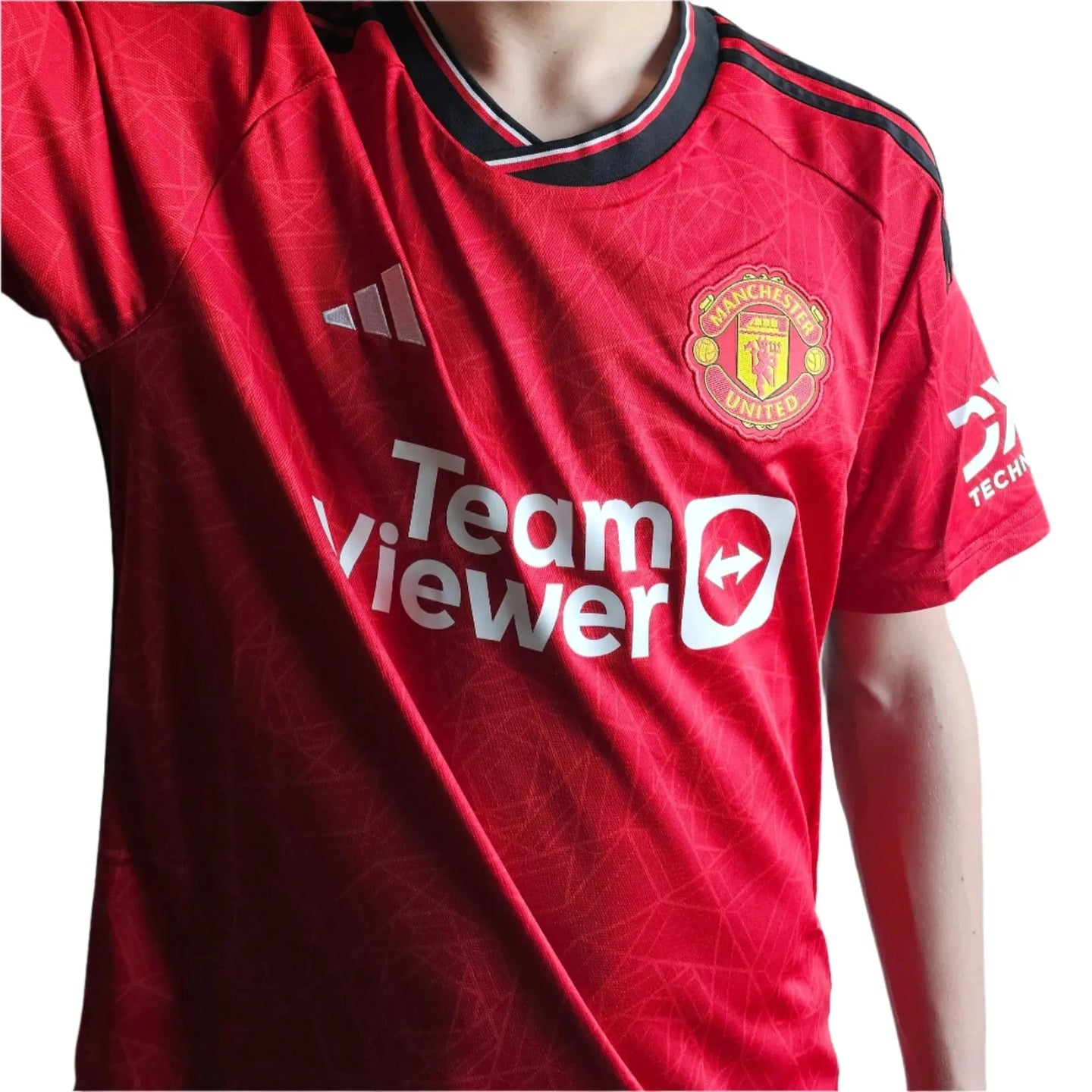 Front view of a red Manchester United football shirt with TeamViewer logo and adidas branding.
