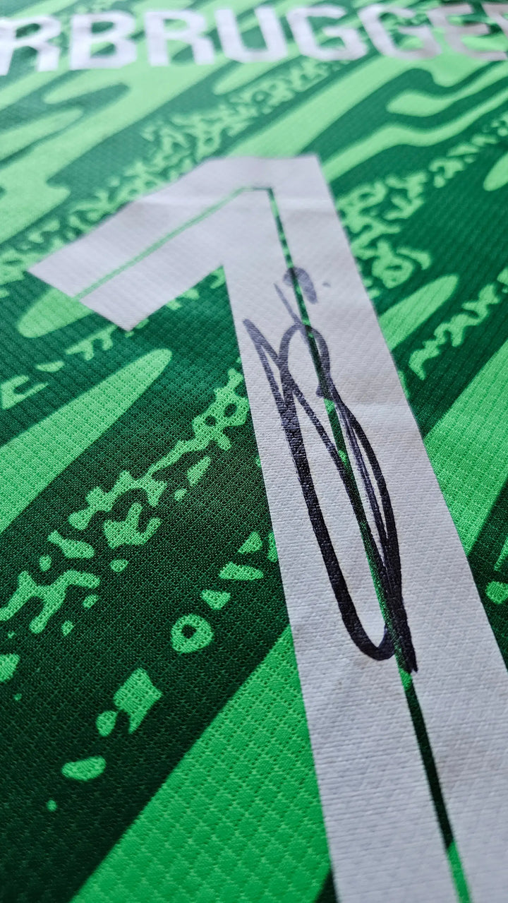 Detail of No. 1 with signature on a green football shirt featuring Bart Verbruggen.