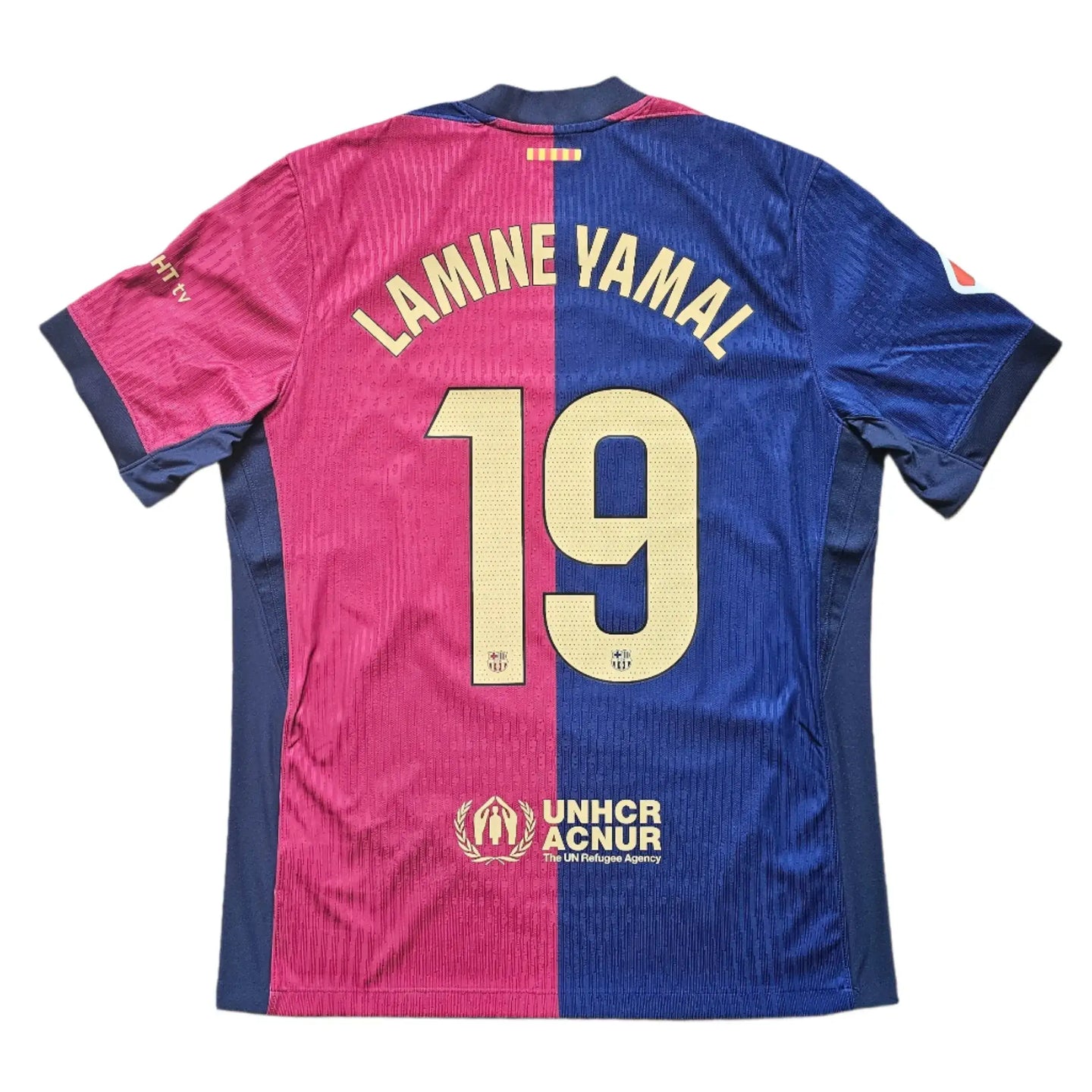 Back view showing Lamine Yamal and No. 19 with UNHCR sponsor logo.