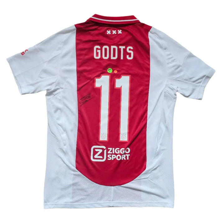 Back view showing No. 11, name GODTS, and signature on red panel of Ajax football shirt.
