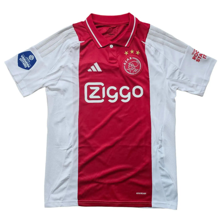 Front view of Mika Godts 11 Ajax football shirt with Ziggo logo and three stars on the crest.