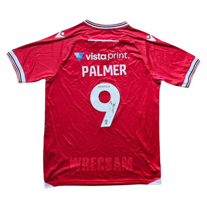 Back view showing player name PALMER, squad number 9, and signature on red soccer jersey.