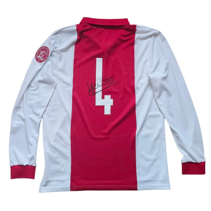 Back view displaying No. 4 and Ronald Koeman's signature on a red and white football shirt.