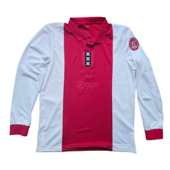 Front view of red and white football shirt featuring zigzag collar, Adidas logo, and Ziggo wordmark.