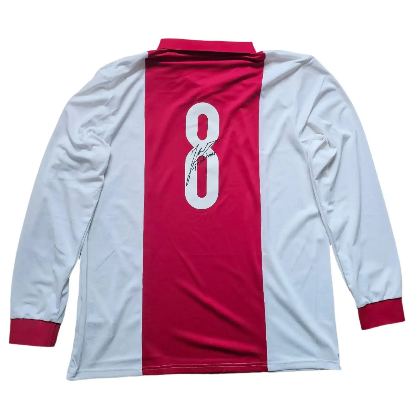 Back view showing No. 8 with signature on red and white shirt.