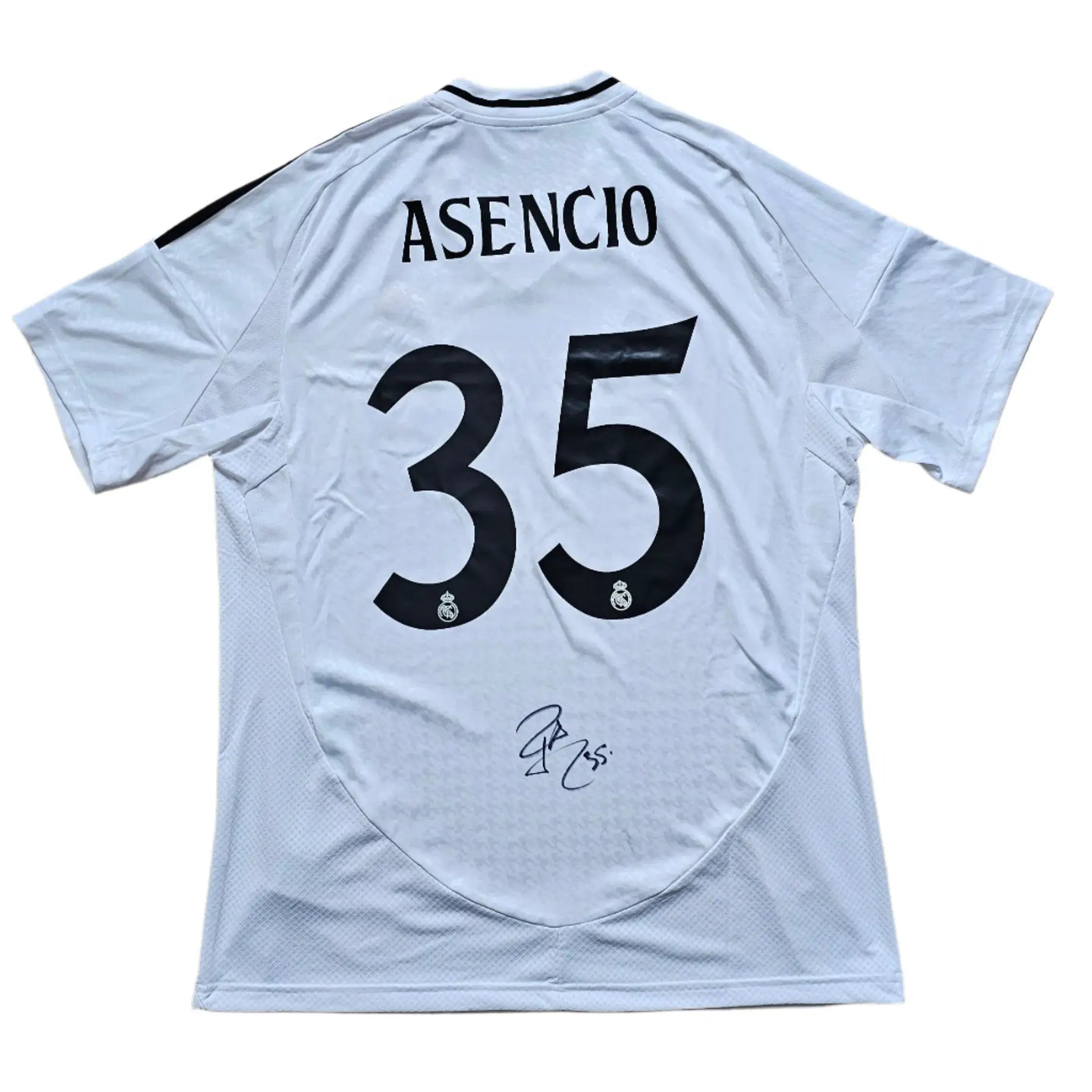 Back view featuring Asencio, No. 35, and a visible signature on a white soccer jersey.