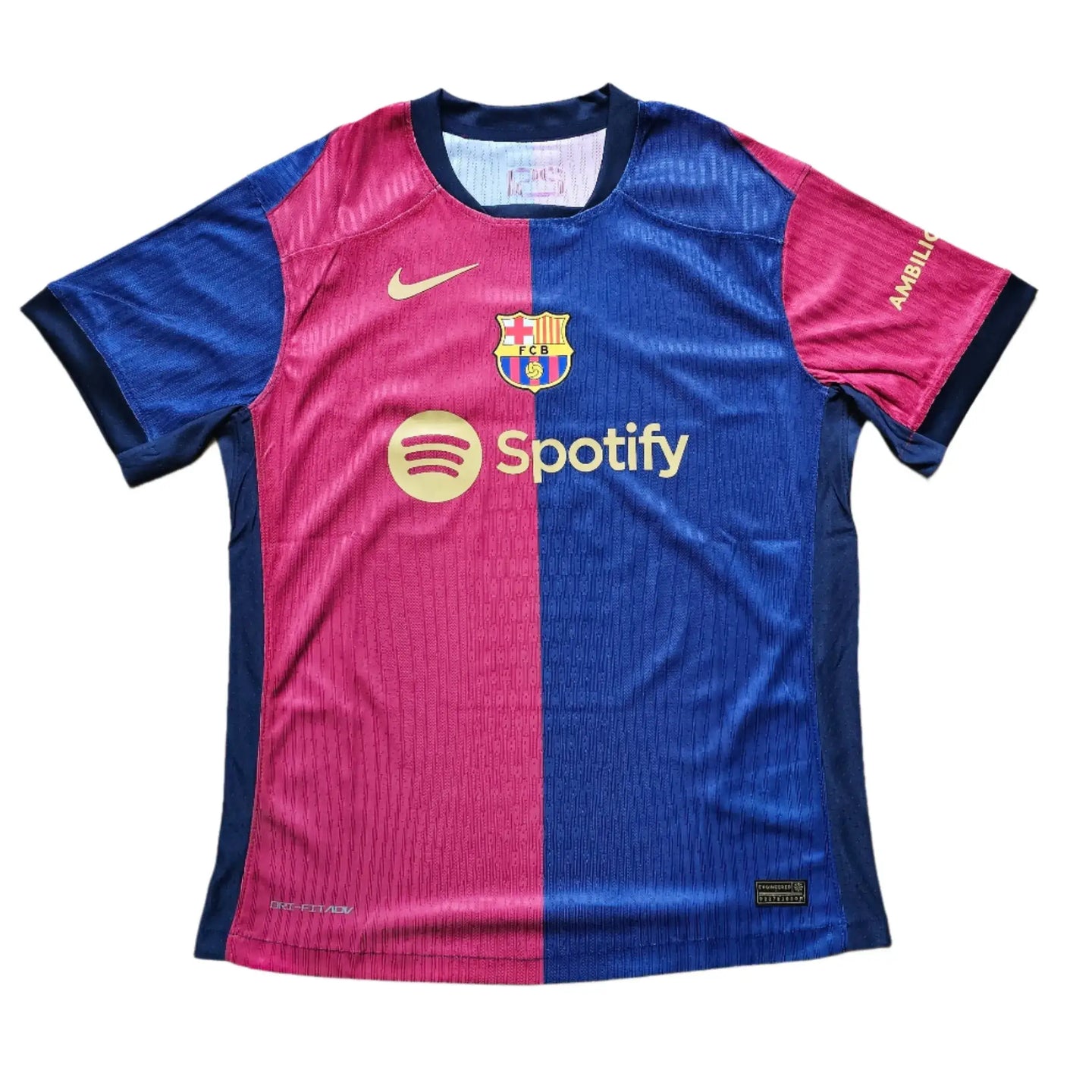 Front view of the Barcelona football shirt with Nike logo, Spotify sponsor, and FCB crest.