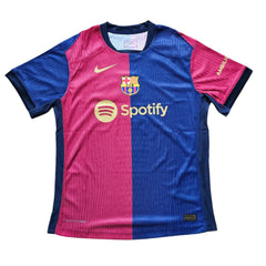 Front view of the Barcelona football shirt with Nike logo, Spotify sponsor, and FCB crest.