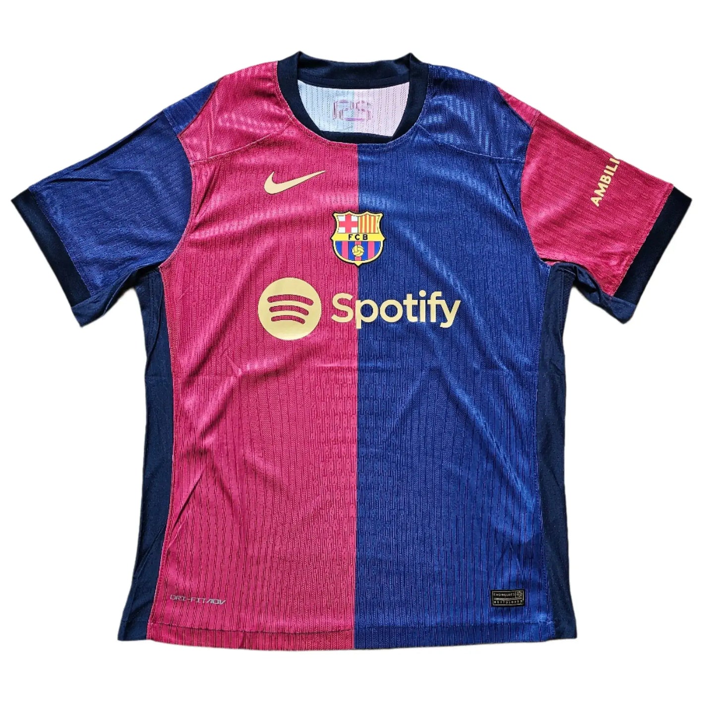 Front view of a blue and red Barcelona soccer jersey featuring Spotify logo and FCB crest.