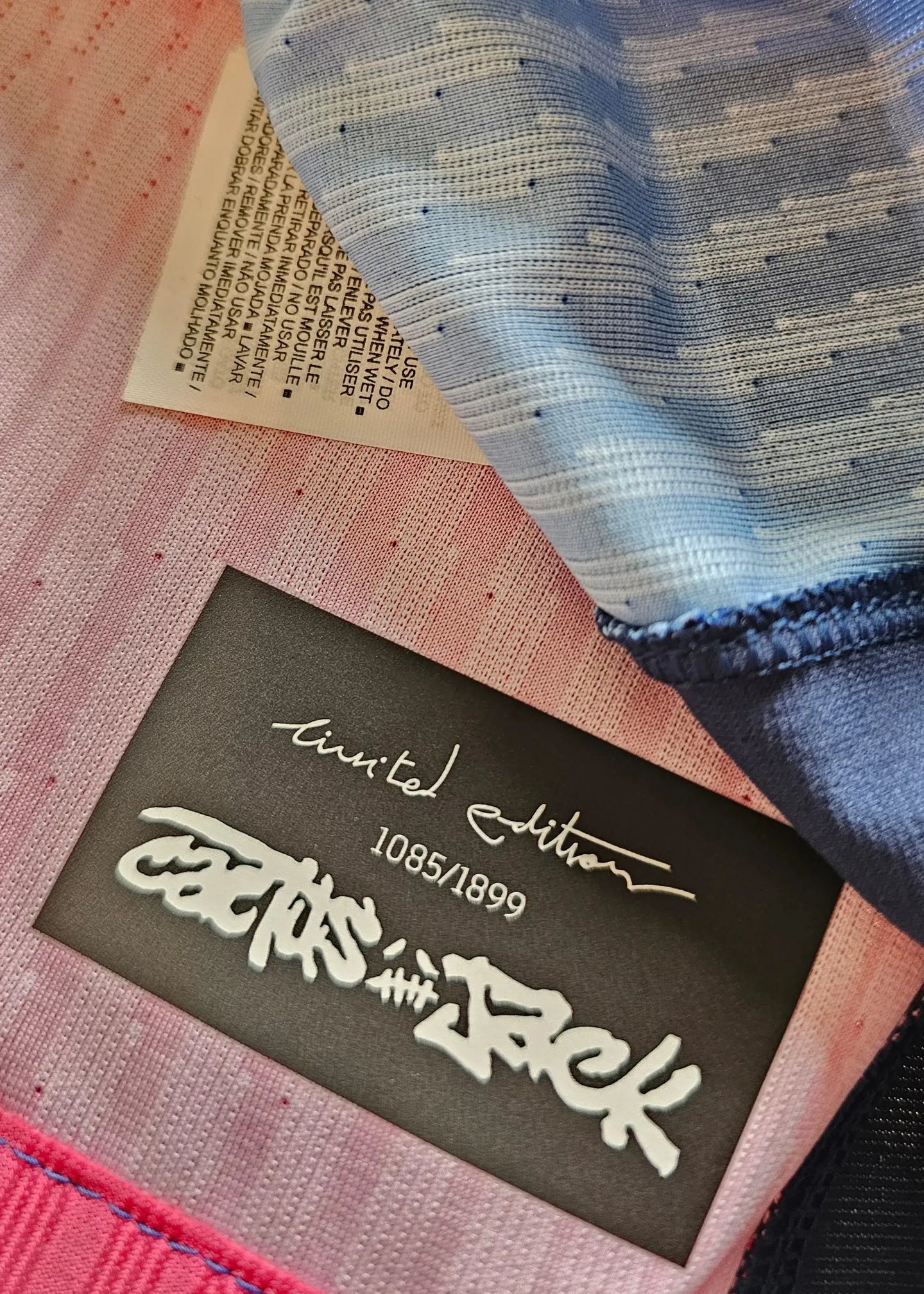 Limited edition tag showing "limited edition 1085/1899" and Cactus Jack logo.