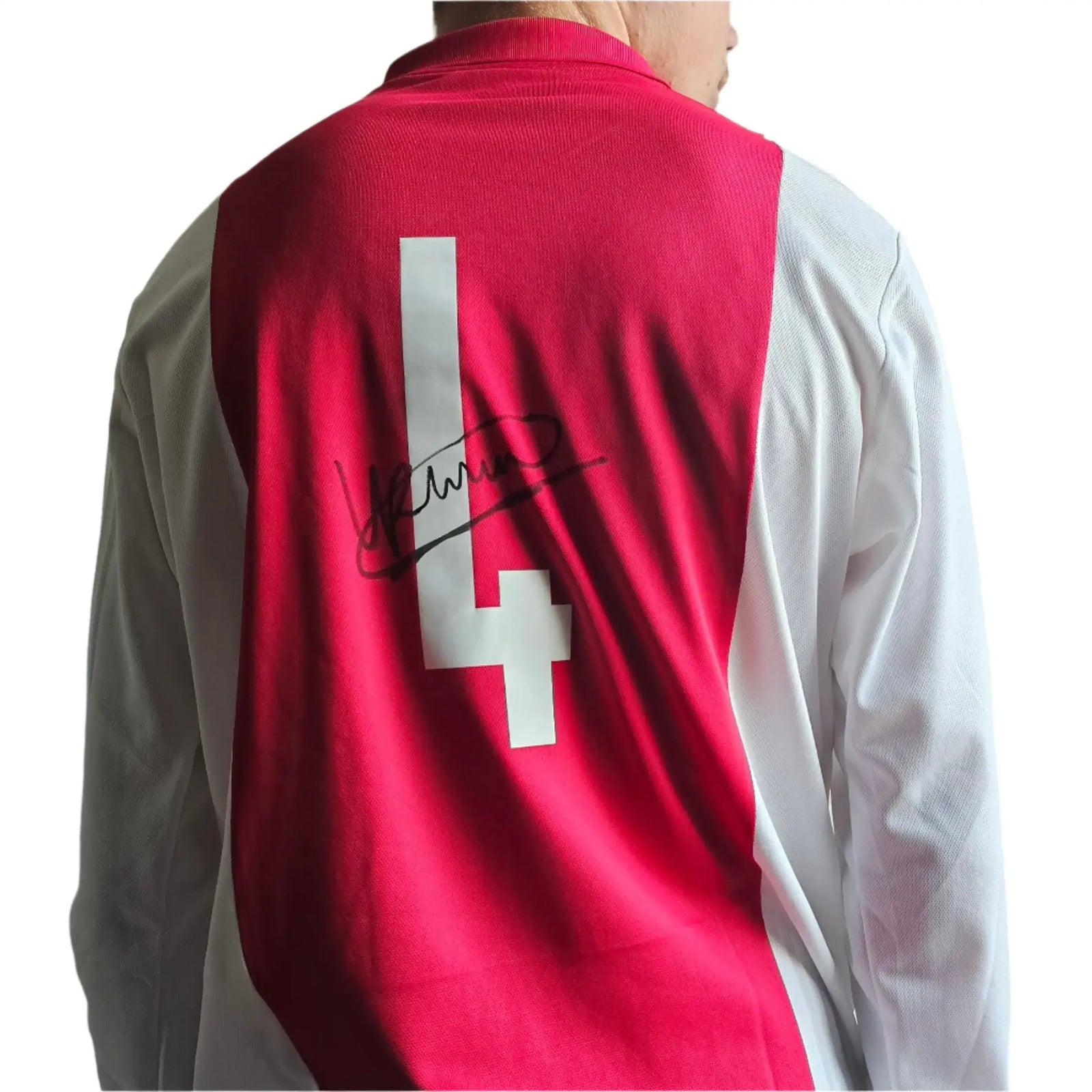 Back view featuring No. 4 and signature on a red and white football shirt.