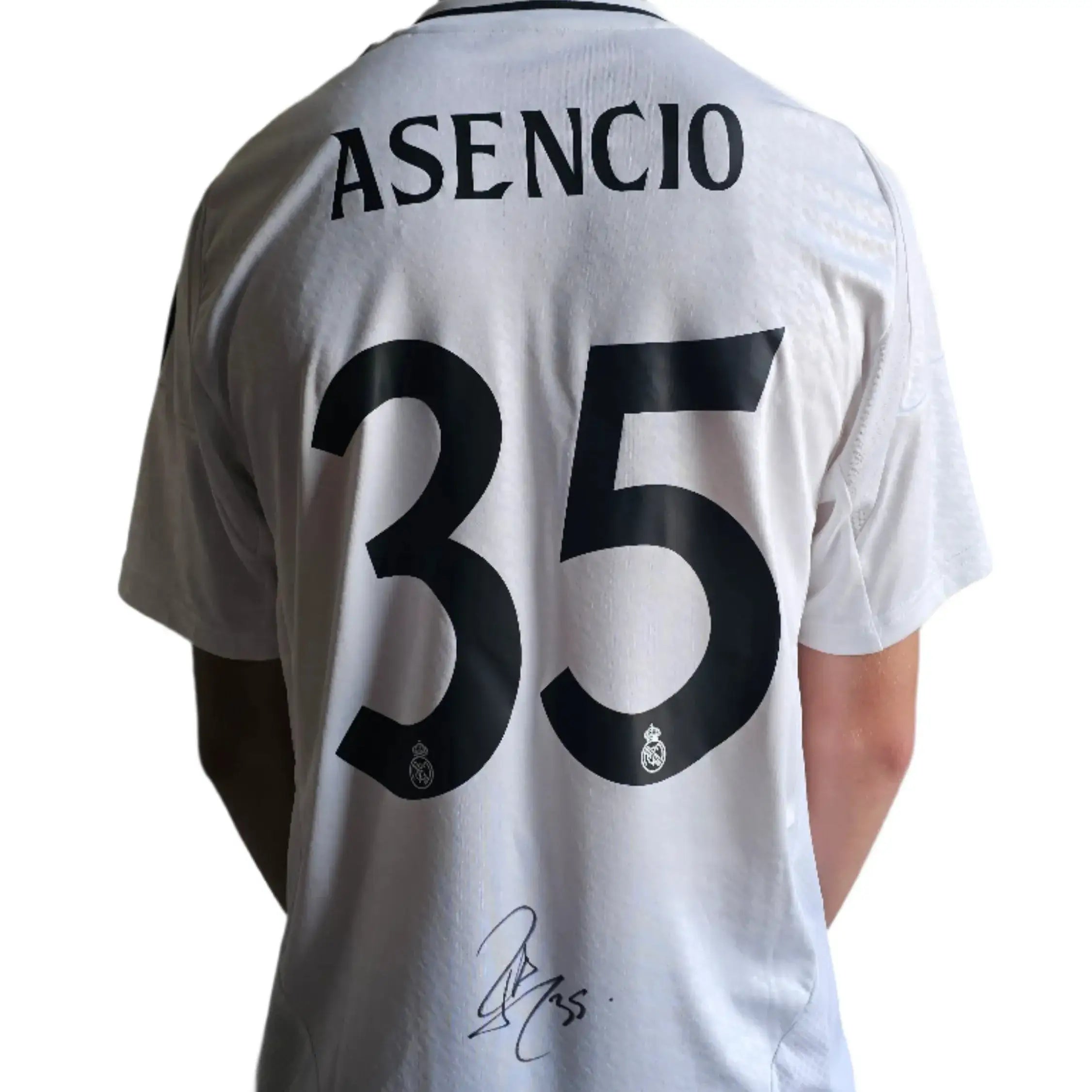 Back view showing Asensio, No. 35, Real Madrid crest, and the player's signature.