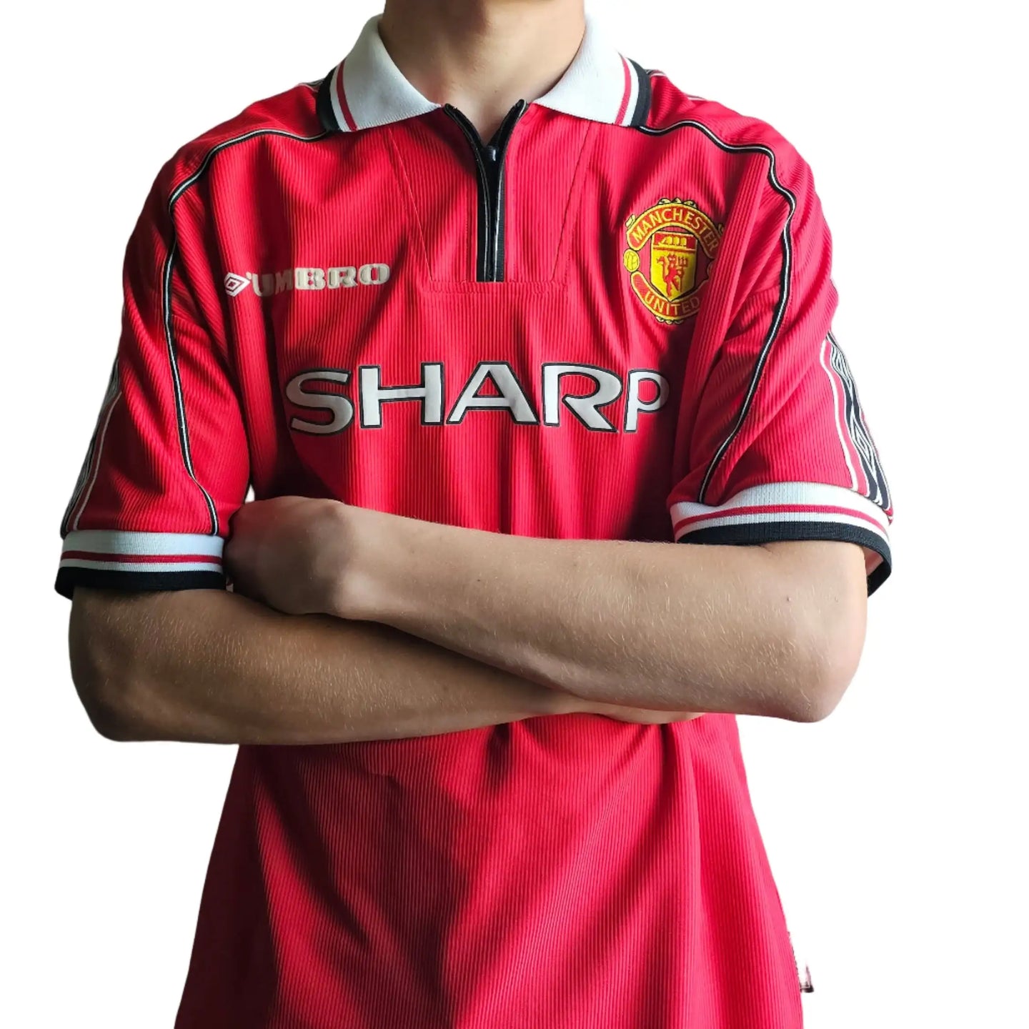 Back view showing the Manchester United crest and the word 'SHARP' prominently displayed.