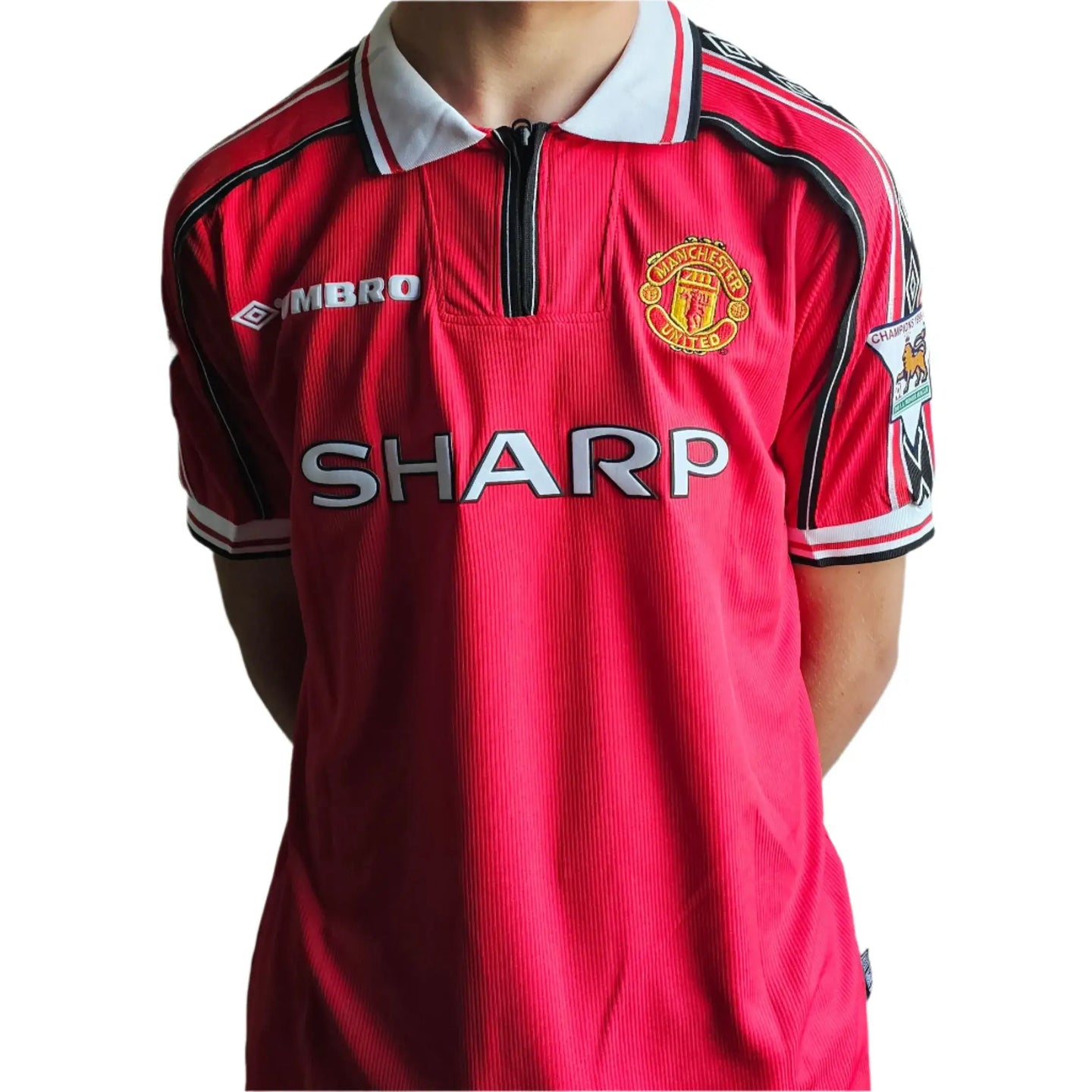 Front view of a signed Jaap Stam 6 Manchester United football shirt featuring the SHARP logo and crest.