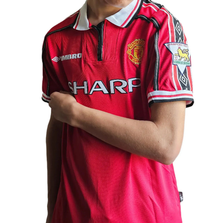 Front view of Jaap Stam No. 6 Manchester United soccer jersey featuring SHARP sponsor and crest.