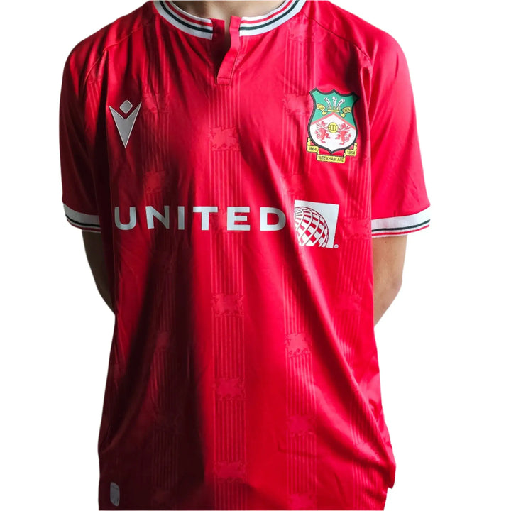 Front view of red Wrexham AFC soccer jersey with crest and &