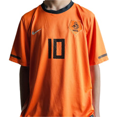 Front view of orange football shirt featuring No. 10 and KNVB crest.