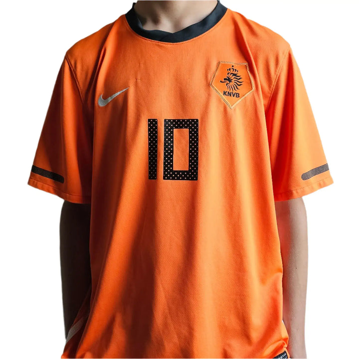 Front view of orange football shirt featuring No. 10 and KNVB crest.
