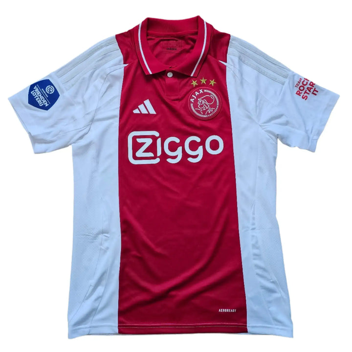 Front view of Jorthy Mokio Ajax Signed Football Shirt with Ziggo logo and two stars on crest.