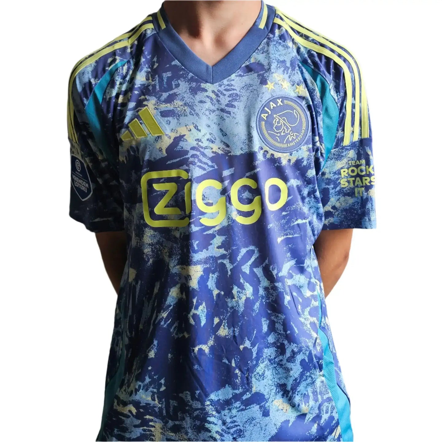 Front view of Jorthy Mokio 31 Ajax football shirt with Ziggo sponsor and blue-yellow design.