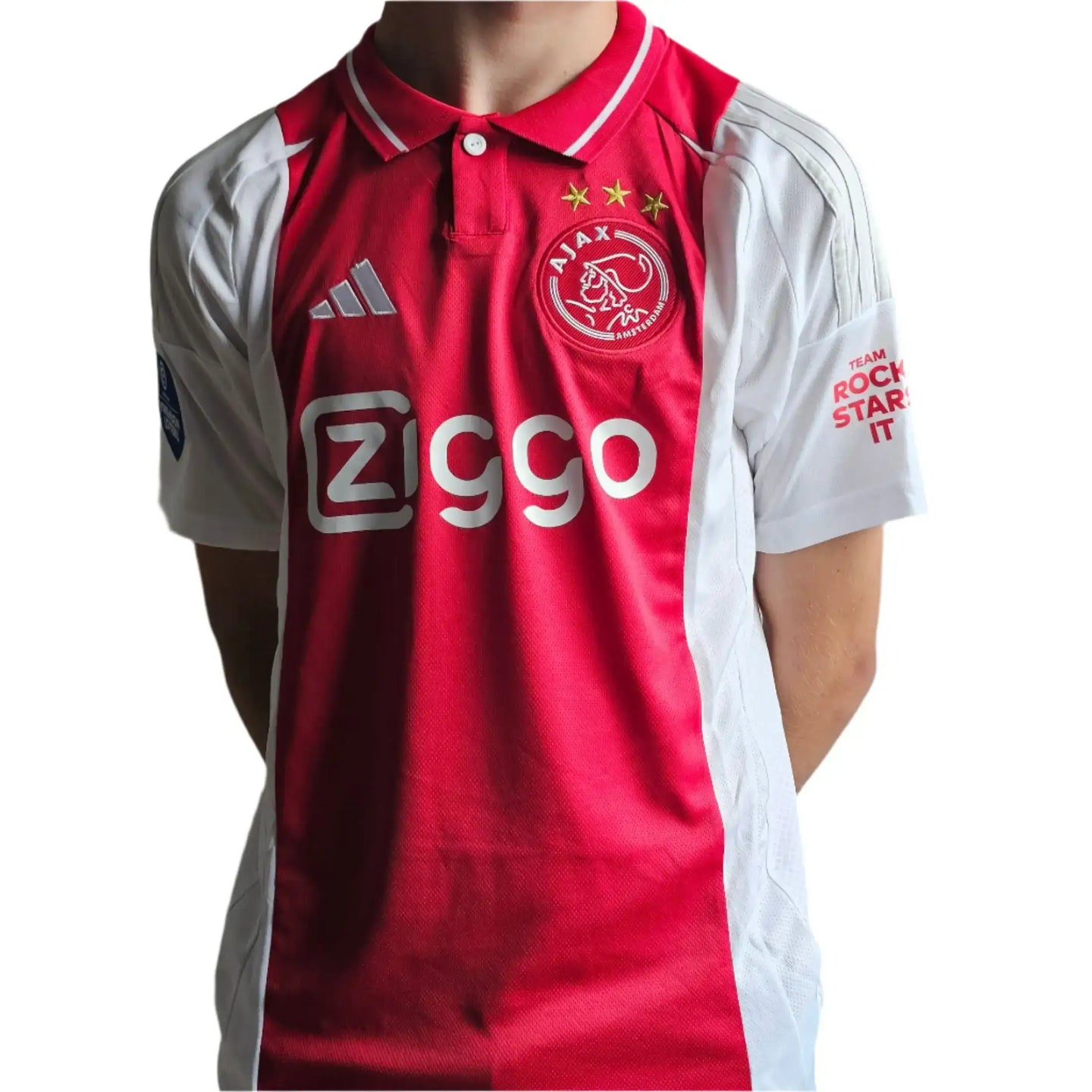 Front view of Ajax football shirt featuring Ziggo sponsor, three stars, and Ajax crest.